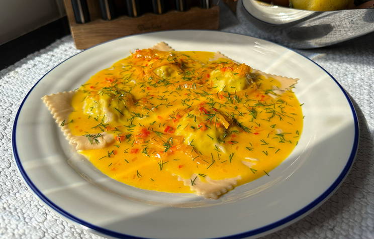 Crab ravioli with a saffron, fennel and chilli butter sauce