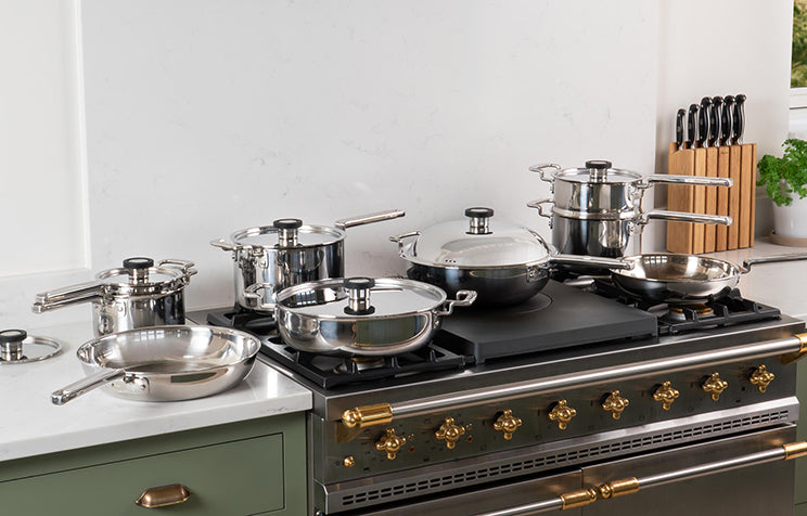 A modern kitchen stove with 316 Series Cookware Set.